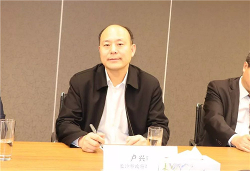 绿之韵胡国安董事长陪同中共长沙市委常委一行赴香港交易所考察座谈