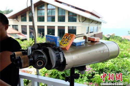 利用望远镜观景传播涉传言论,广西北海端掉一涉传窝点