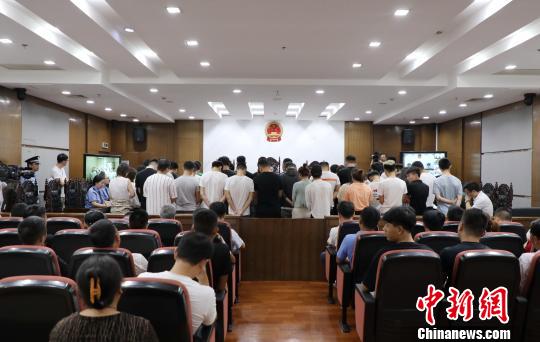 扮演“白富美”诈骗1.4亿元106名“业务员”集中被判